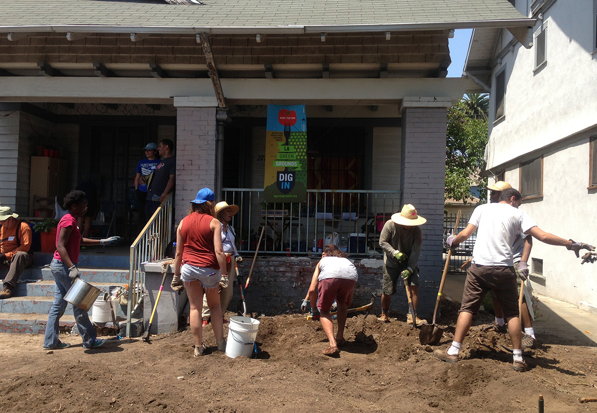 Florence Nishida and other LA Green Grounds members working on a sustainable garden at a house