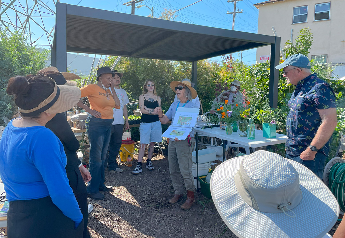 Florence giving a presentation in local garden