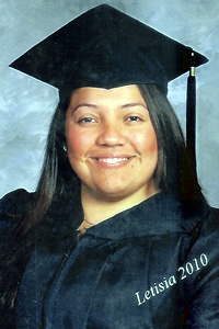 Letisia Alvarado in cap and gown at UC Berkeley